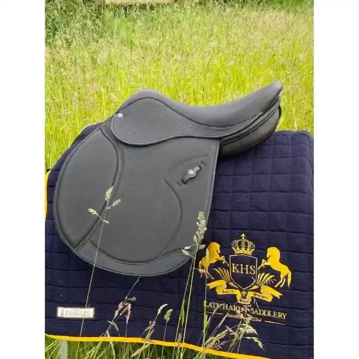 The Caroline GP saddle on a navy and gold KHS pad