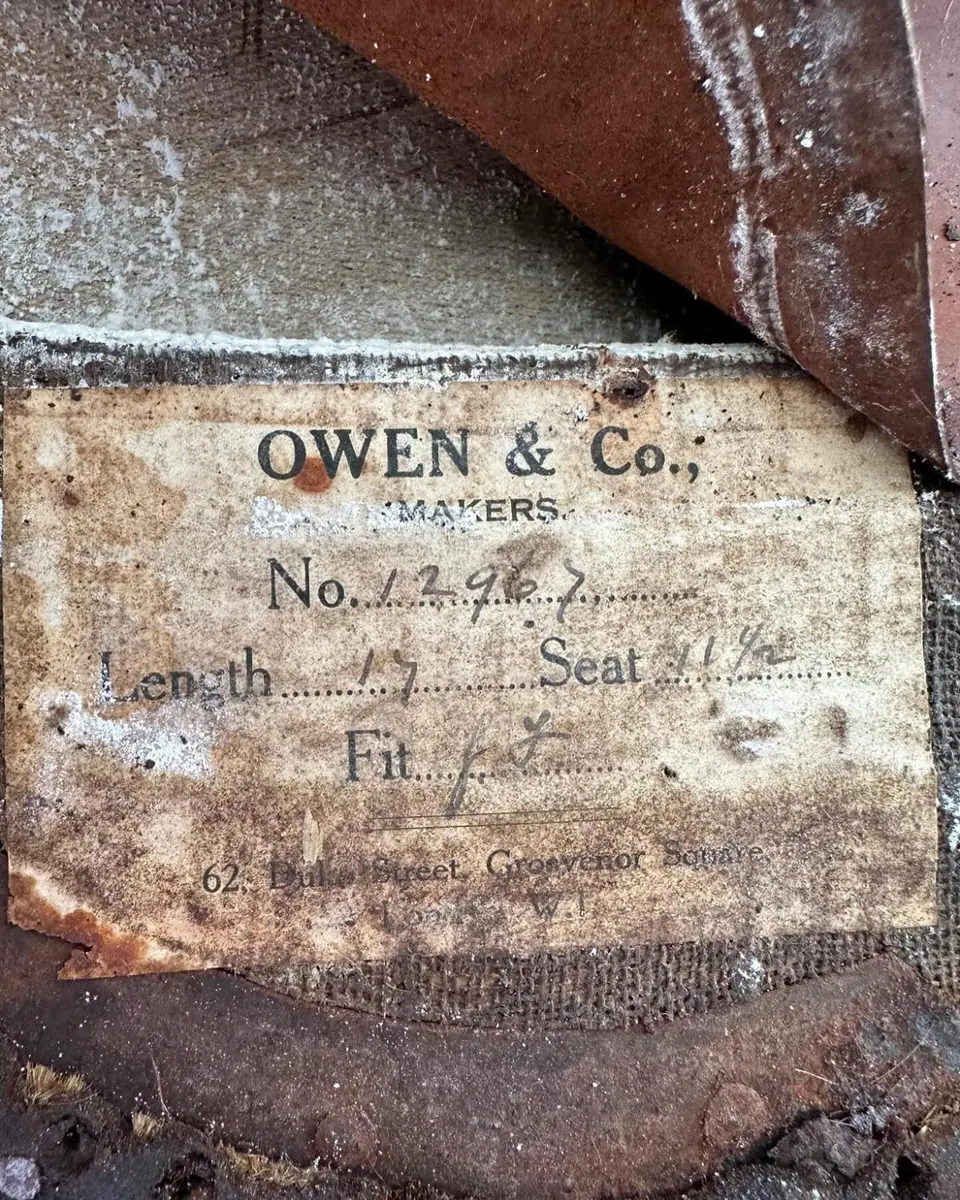 The Owen and Co maker's label inside an old side saddle