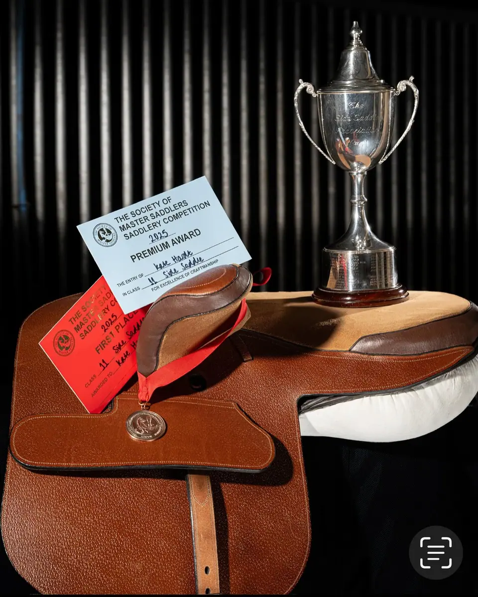 The winning side saddle with the Side Saddle Association Cup and first prize card
